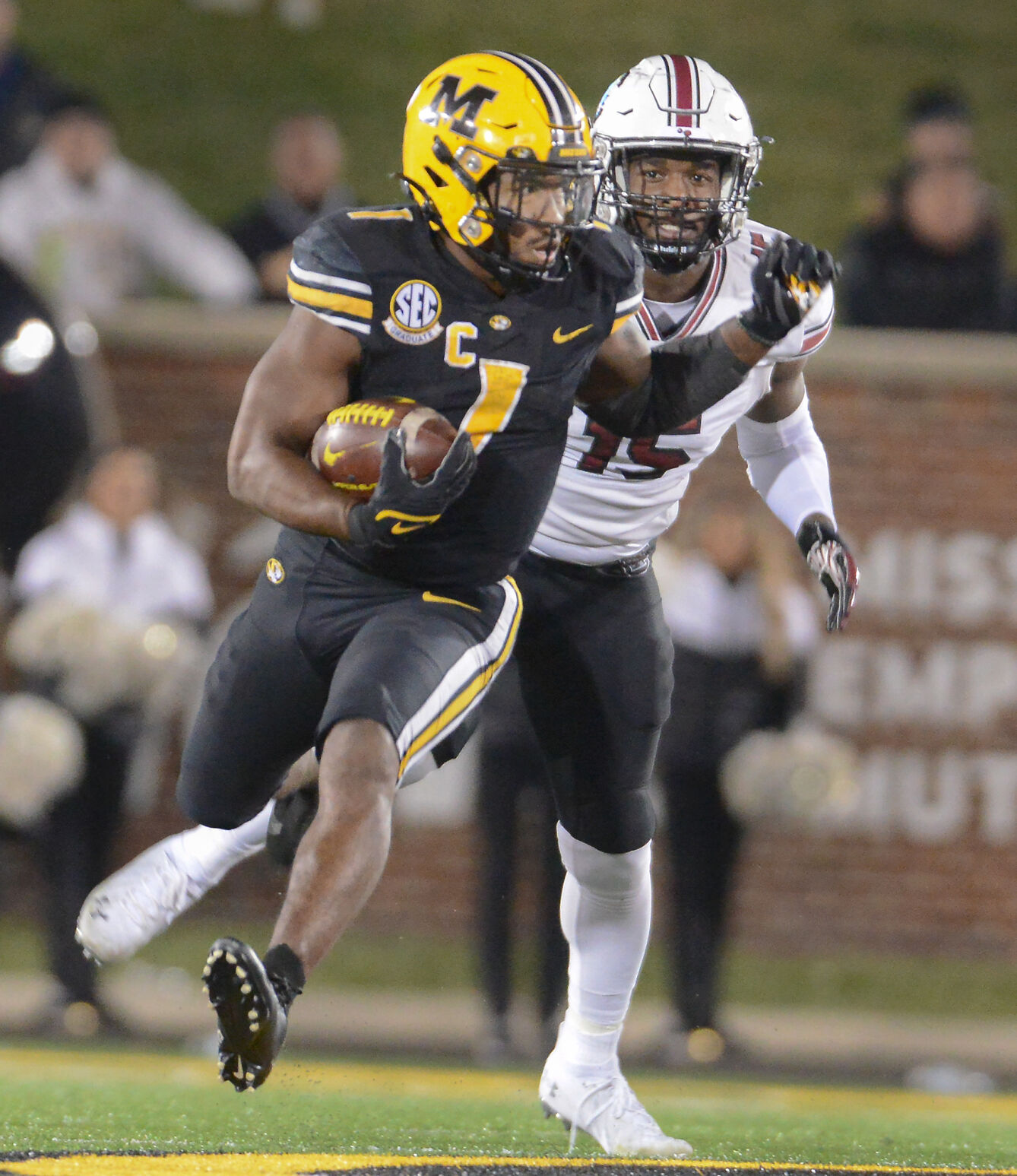 Tyler Badie runs with the ball